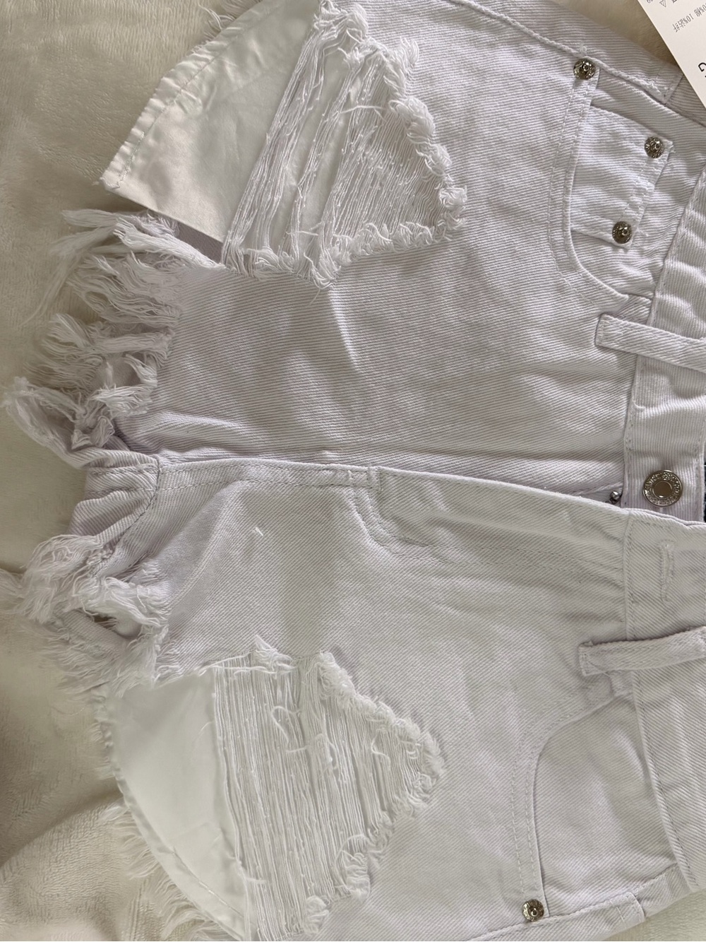 High-Rise White Distressed Denim Shorts